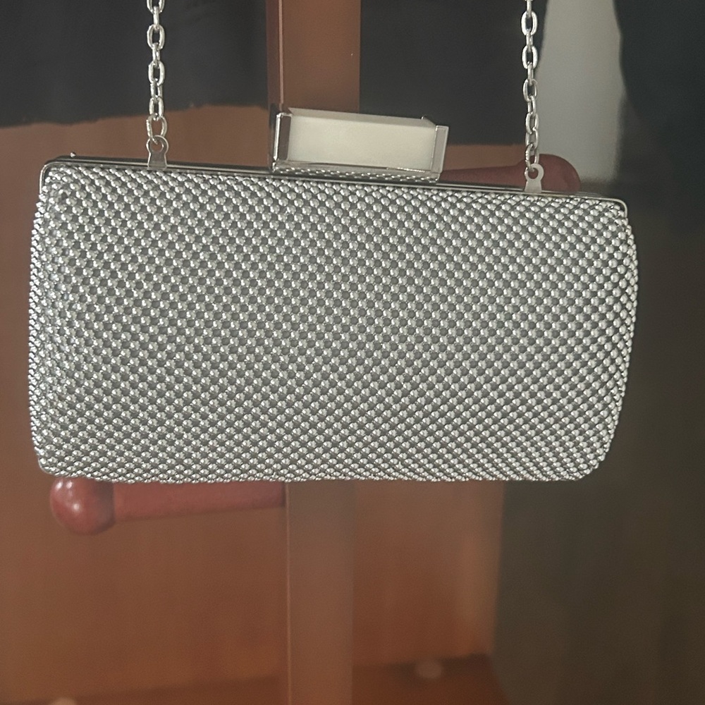 Jessica McClintock 
 Elegant Silver Clutch Bag